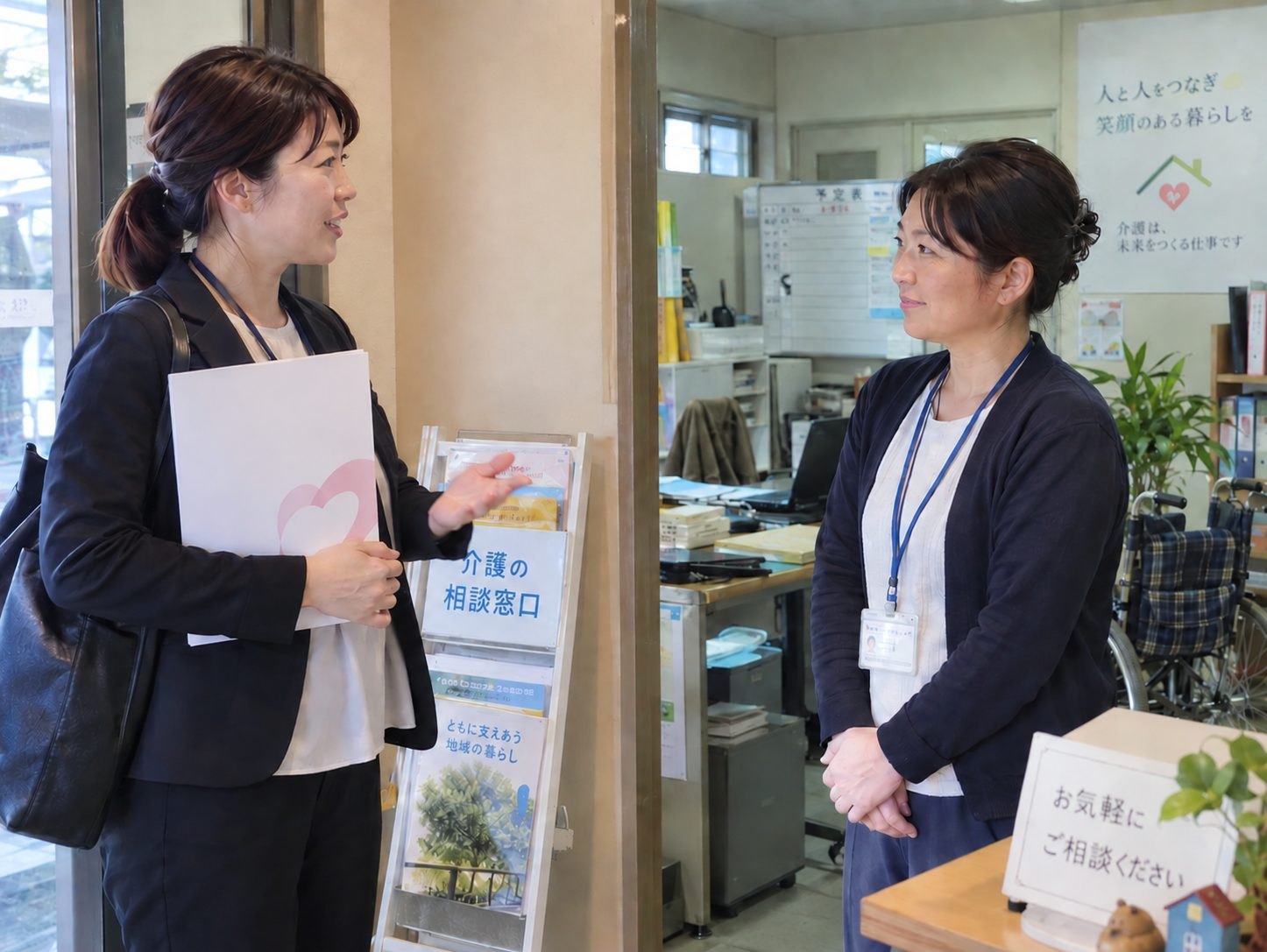 病院の地域医療連携室前で担当者の反応を伺うTHRIVEスタッフ